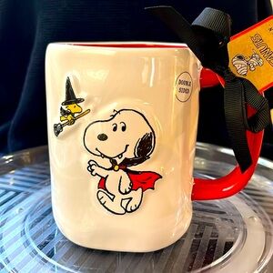Rae Dunn /w Peanuts snoopy, and Woodstock Halloween coffee mug.